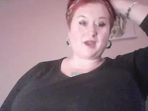 Snapshot of BustyRedxx chatting on February 23, 2026, 12:06 pm BustyRedxx online show from February 23, 2026, 12:06 pm